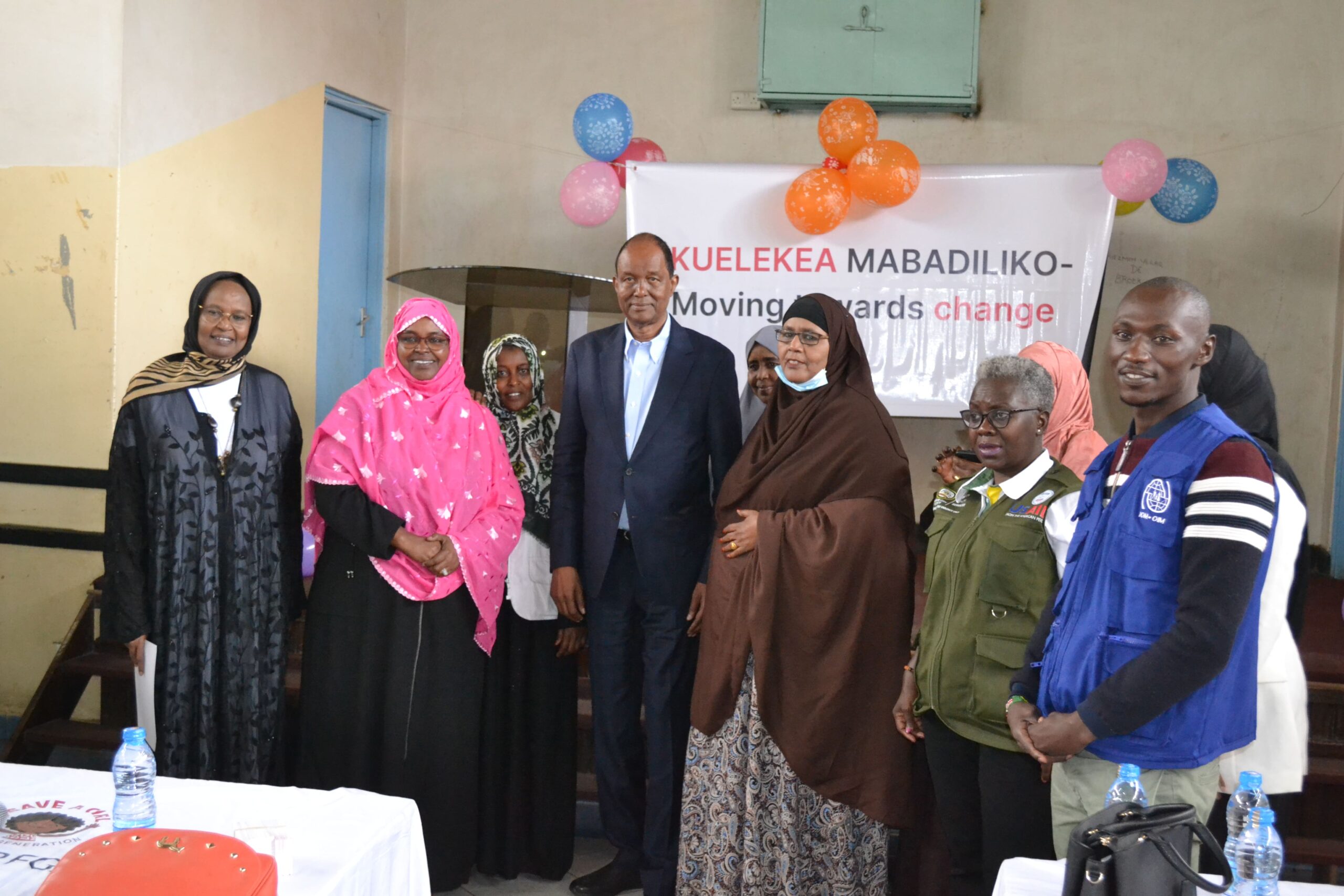 Family photo with MP Yussf Hassan and other organizations.